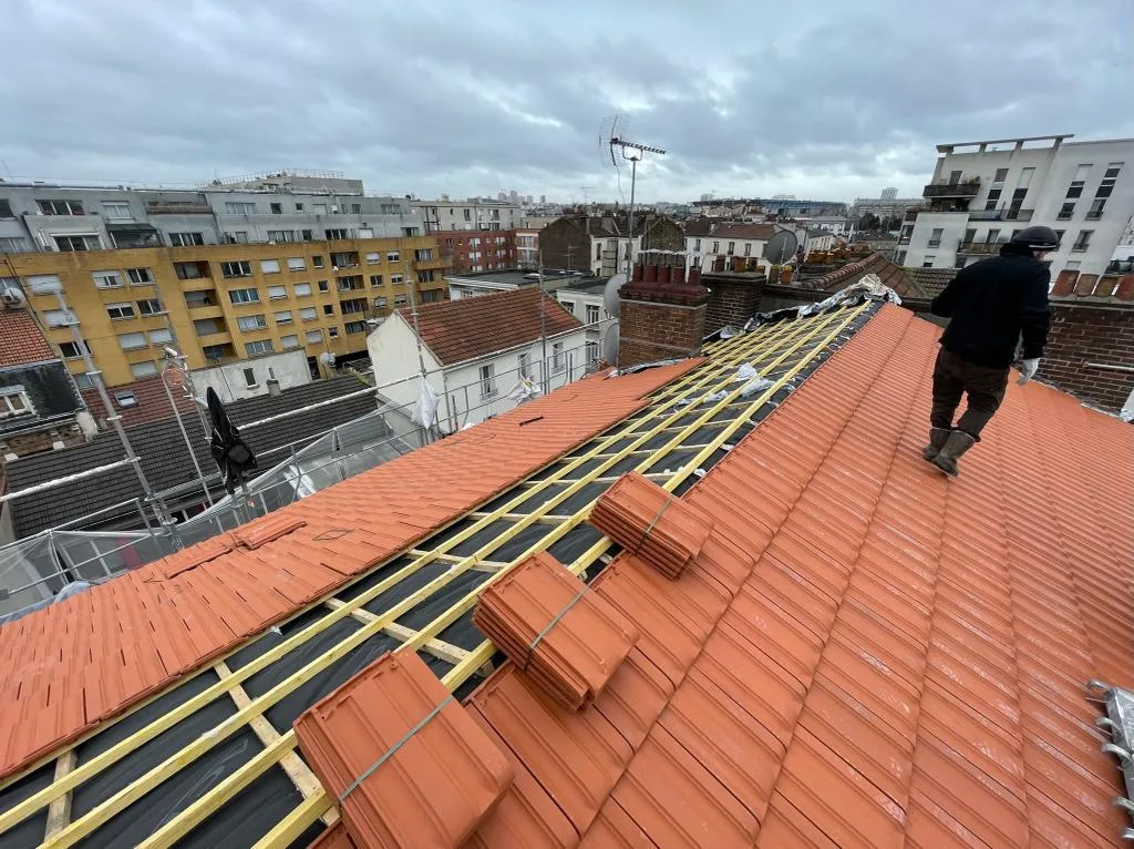 Réalisation : Réfection de couverture en tuiles — Couverture